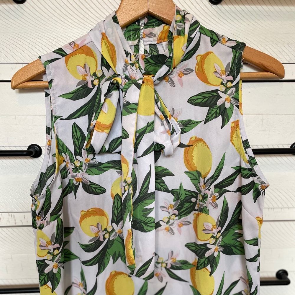 Lemons Sleeveless Blouse with Tie Front and Bib Collar